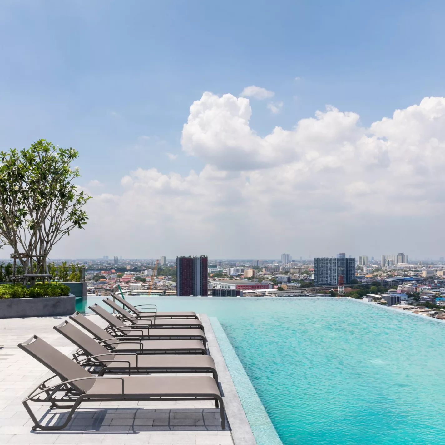 roof top deck with view of a cityscape