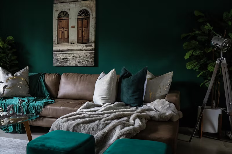 Living room with dark green walls